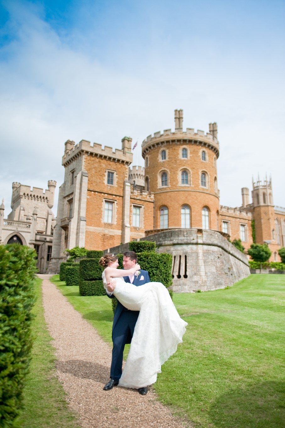 Image of bride and groom in front of the Castle 