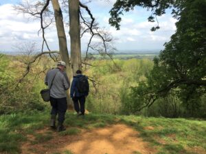 Images of two men walking away into the country side for Belvoir Ark data collection 